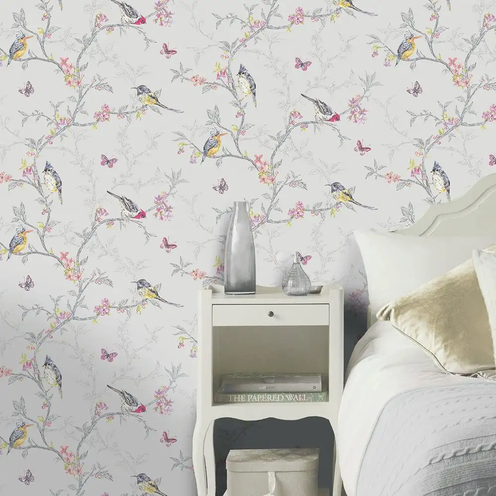 Colorful bird-themed wallpaper installed in a stylish Dubai living space